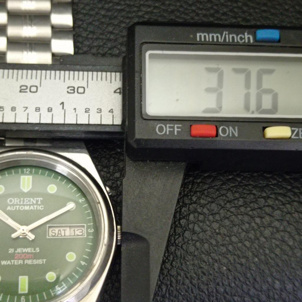 GENUINE VINTAGE ORIENT AUTOMATIC 46941 JAPAN MENS GREEN DIAL WATCH A701886-5 R207-a701886