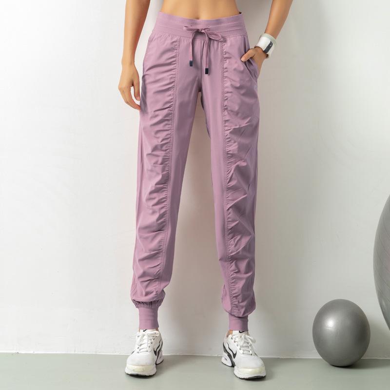 2021 Spring Women's Breathable Loose Fit Nine-Point Running Pants with Pockets