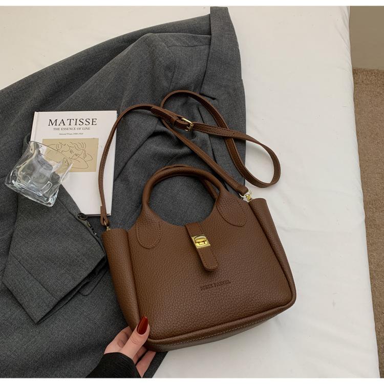 

Сумка премиум-класса женская 2025 весна новая модная стильная сумочка универсальная сумка-ведро для поездок на работу сумка через плечо темно-коричневого