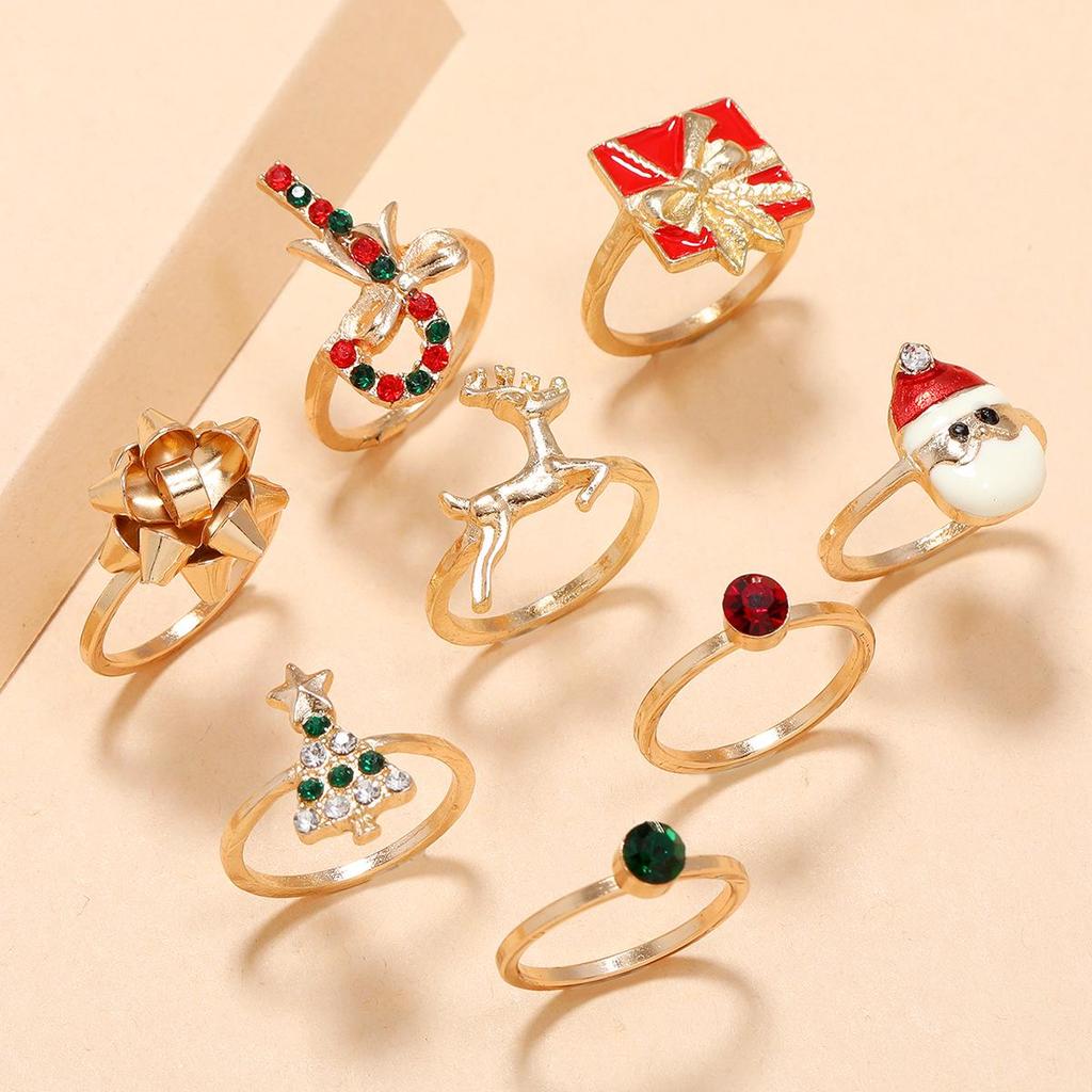 8-Piece European Christmas Rhinestone Ring Set: Tree, Santa, Bowtie & Reindeer Designs