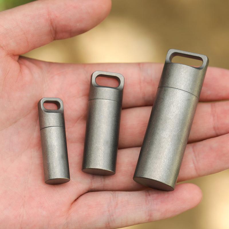 EDC Pockey Mini Voll-Titan-Metall Aufbewahrungsflasche Wasserdicht Schlüsselanhänger Pillendose Box Versiegelt für Zubehör Outdoor Camping