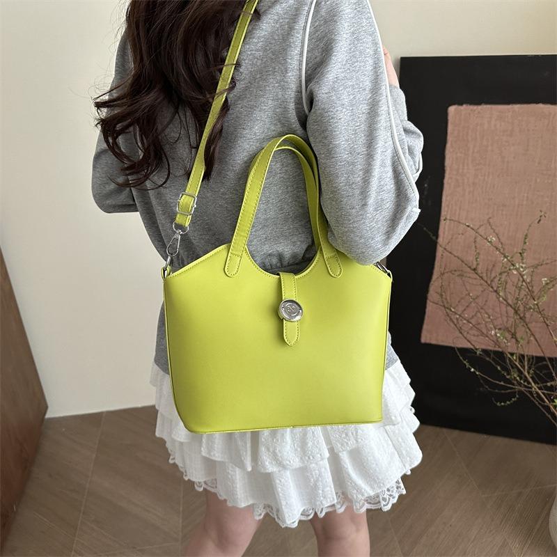 Geantă de mână cu design de nișă, temperament nou, versatilă, culoare solidă, geantă bucket de umăr, geantă messenger urbană pentru navetă, femei