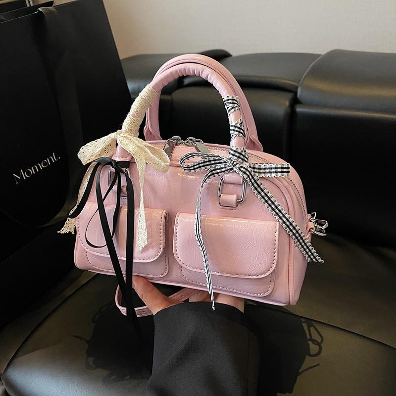 

High-end foreign style small bag women s summer 2025 new fashion niche messenger bag women s portable Boston bag розовый