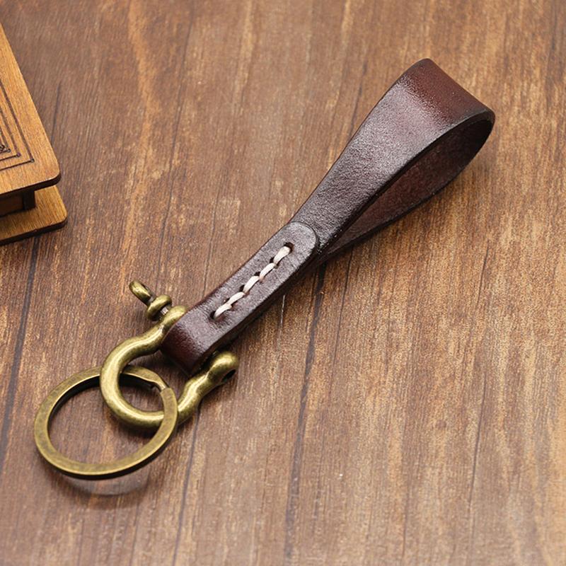 

Простой брелок ручной работы из коровьей кожи высокого качества, шнурок, ретро-медная пряжка в виде подковы, брелок, кулон, подарок