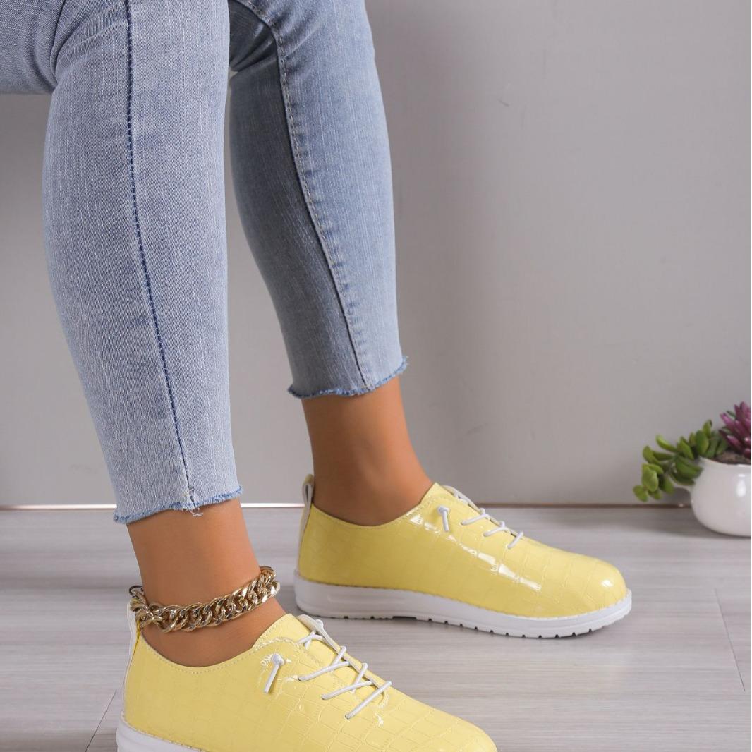 

New large size solid color leather European and American fashion versatile college style flat bottom lace-up women s shoes foreign trade size 43 43 жовтий
