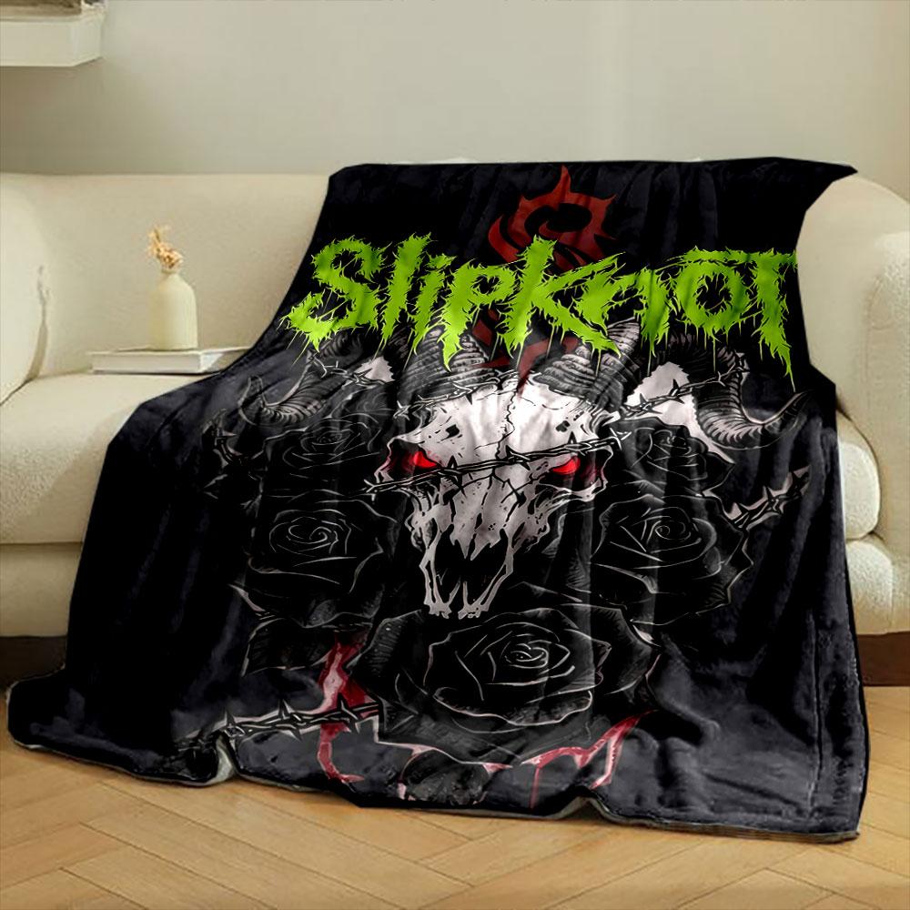 A demonic skull with horns, red eyes, black roses, and barbed wire. for all seasons blanket lunch break throw gift