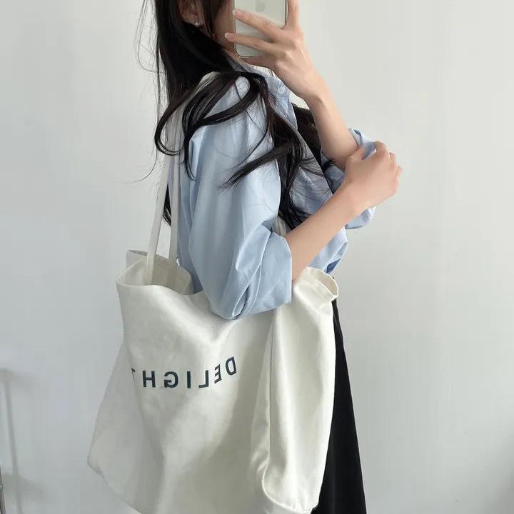 Spring 2025 Korean Chic Women's White Shirt: Loose-Fit Top for Petite Sizes