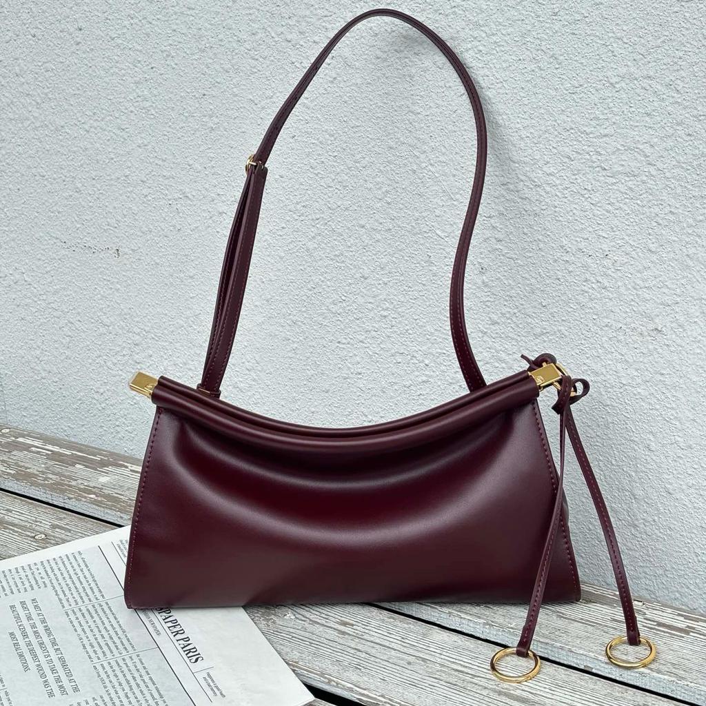 2025 neue Sommer- und Herbst-Clip-Tasche Französische Nischen-Leder-Schulter-Unterarmtasche Leder Retro-Mode Baguette-Tasche Damen