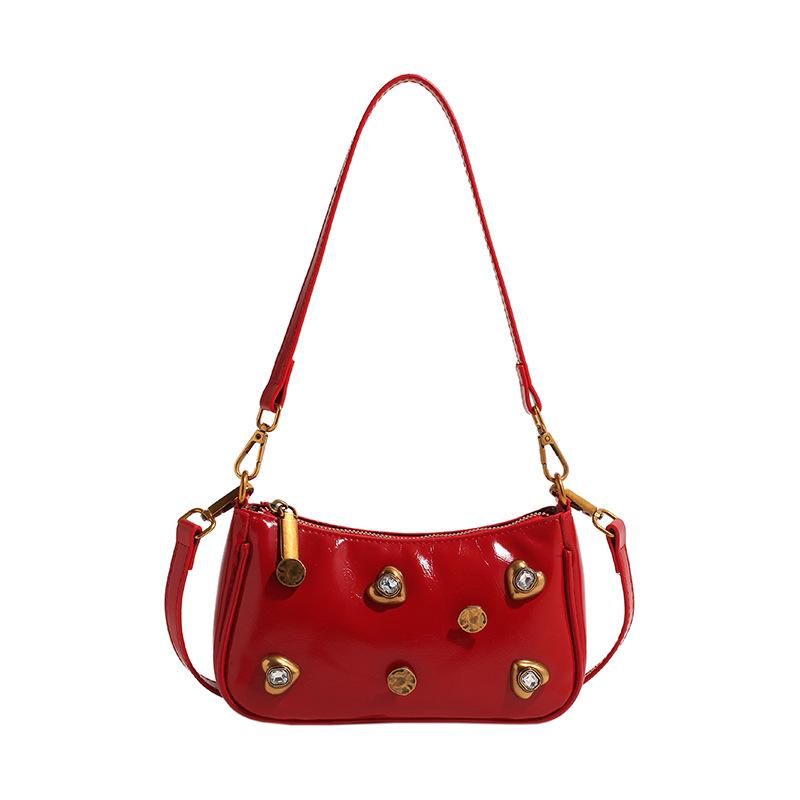 Woman Bags bag 2025 new Korean version of fashion rivets personalized trend women's shoulder crossbody armpit bag