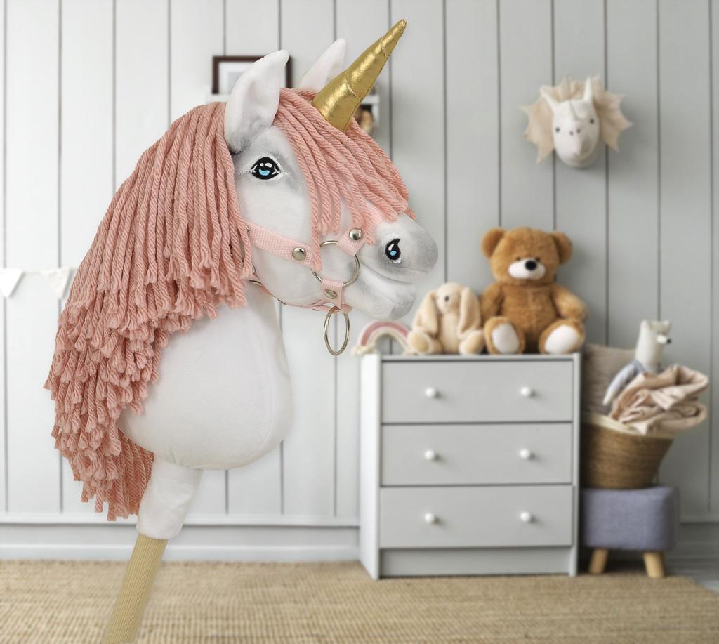Hobby Horse Unicorn on a stick, small white, with a dusty pink mane and a golden horn