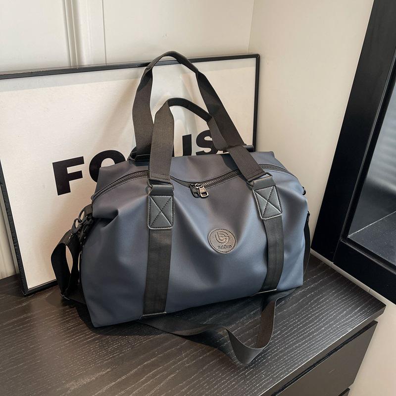 Single-Shoulder Travel Bag: Large-Capacity Luggage with Dry/Wet Separation for Business and Sports.