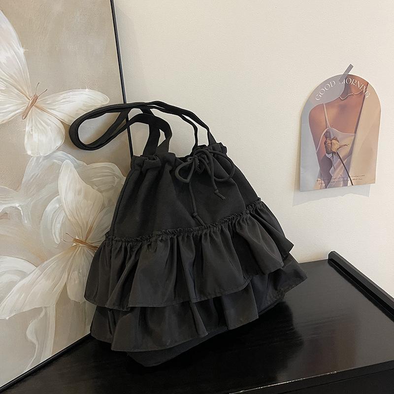 

2025 лето новыйСтуденческая сумка-папка для литературы и искусства большой вместимости с оборкой на плечо холщовая сумка чёрный