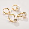 Orecchini Saturn Orb Pearl, Borchie a Croce di Design, Perla di Conchiglia Bifacciale, Orecchini Statement di Lusso