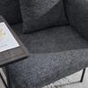 Modern single armchair with comfortable fabric backrest and two storage compartments, complemented by a practical side table.