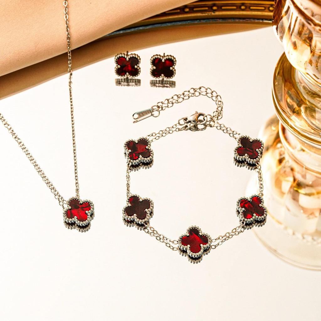 Set 3 pezzi collana bracciale orecchini quadrifoglio double-face in acciaio al titanio
