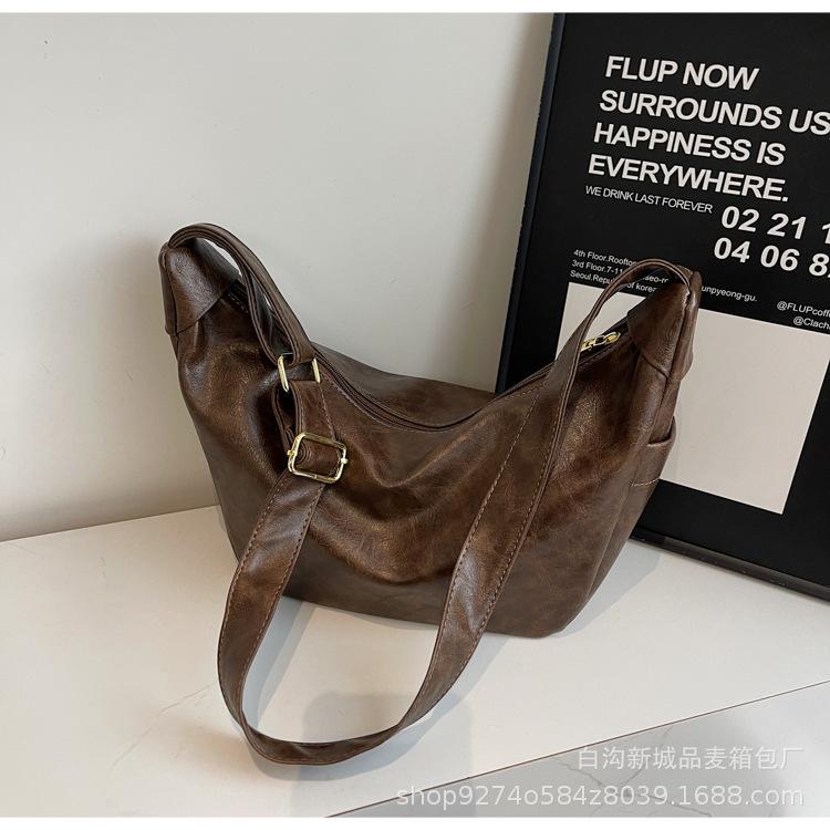 

Autumn and winter soft leather dumpling bag retro large-capacity commuter bag 2025 new women s bag casual one-shoulder messenger tote bag