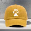 A Baseball Cap Featuring a White Blurry Paw Print Design Suitable for Outdoor Activities And Hiking with a Vintage Washed Look