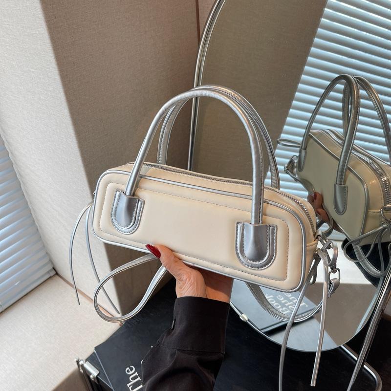 Nischdesignväska dam ny mode mångsidig axelremsväska high-end känsla kontrastfärg bärbar baguetteväska