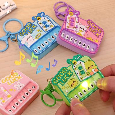 Creative Cartoon Mini Piano Keychain Palm Music Electronic Piano Light Emitting Toys Bag Pendant Catch Machine Children's Toys