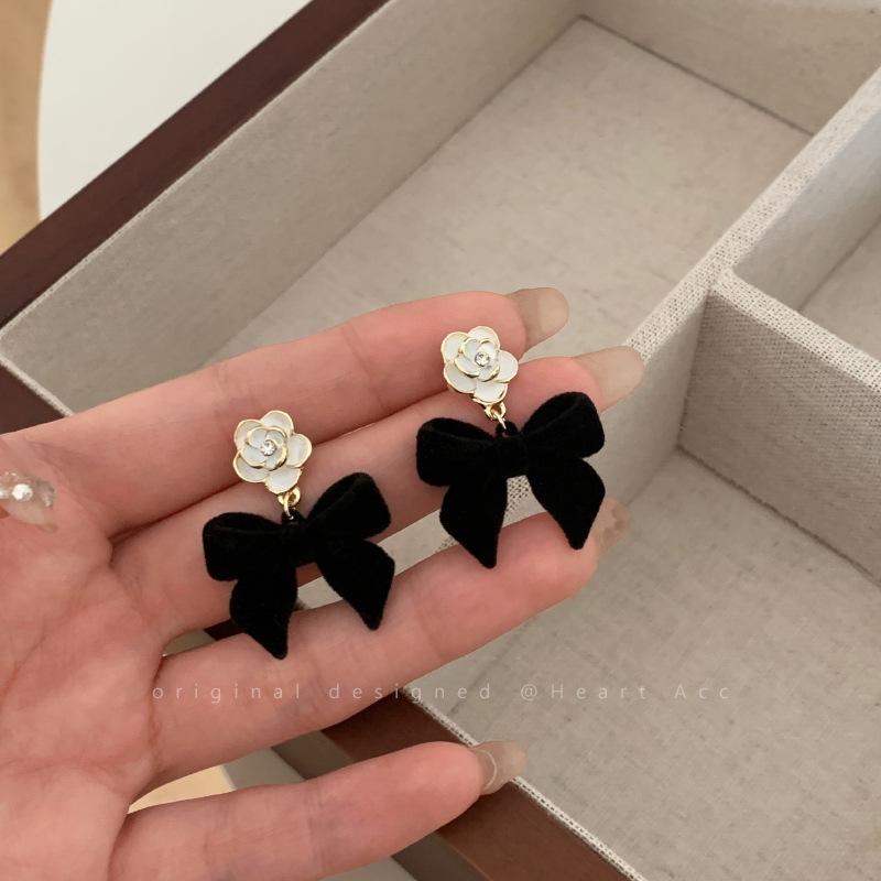 Flocking bow camellia earrings women s autumn and winter new trendy temperament earrings niche design stud earrings