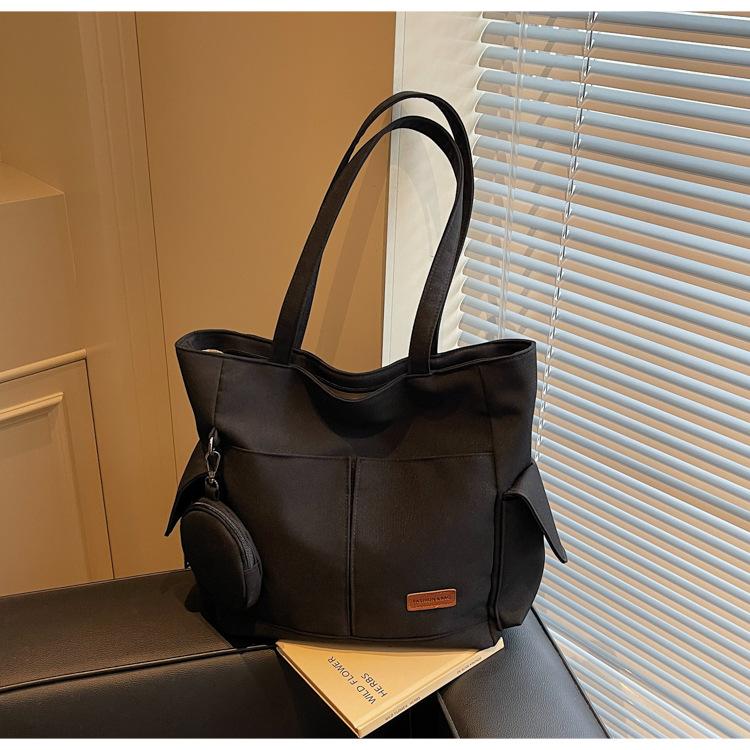 

Korean version of large-capacity season new versatile casual bag women 2025 simple out tote bag casual canvas shoulder bag чёрный