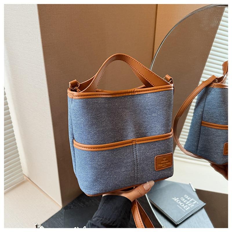 

Summer new fashion high sense large capacity messenger bag simple trend casual commuter bucket bag коричневий