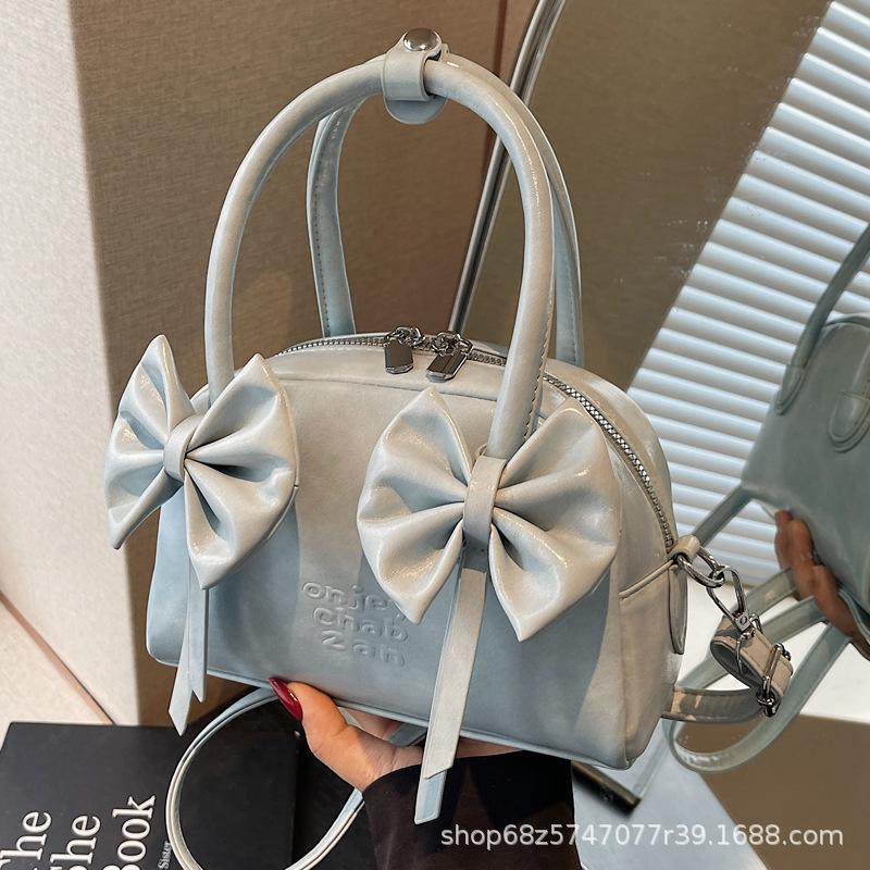 Shoulder bag fresh 2025 new women's bag Korean fashion bow new hand-to-hand small women's bag crossbody shell bag