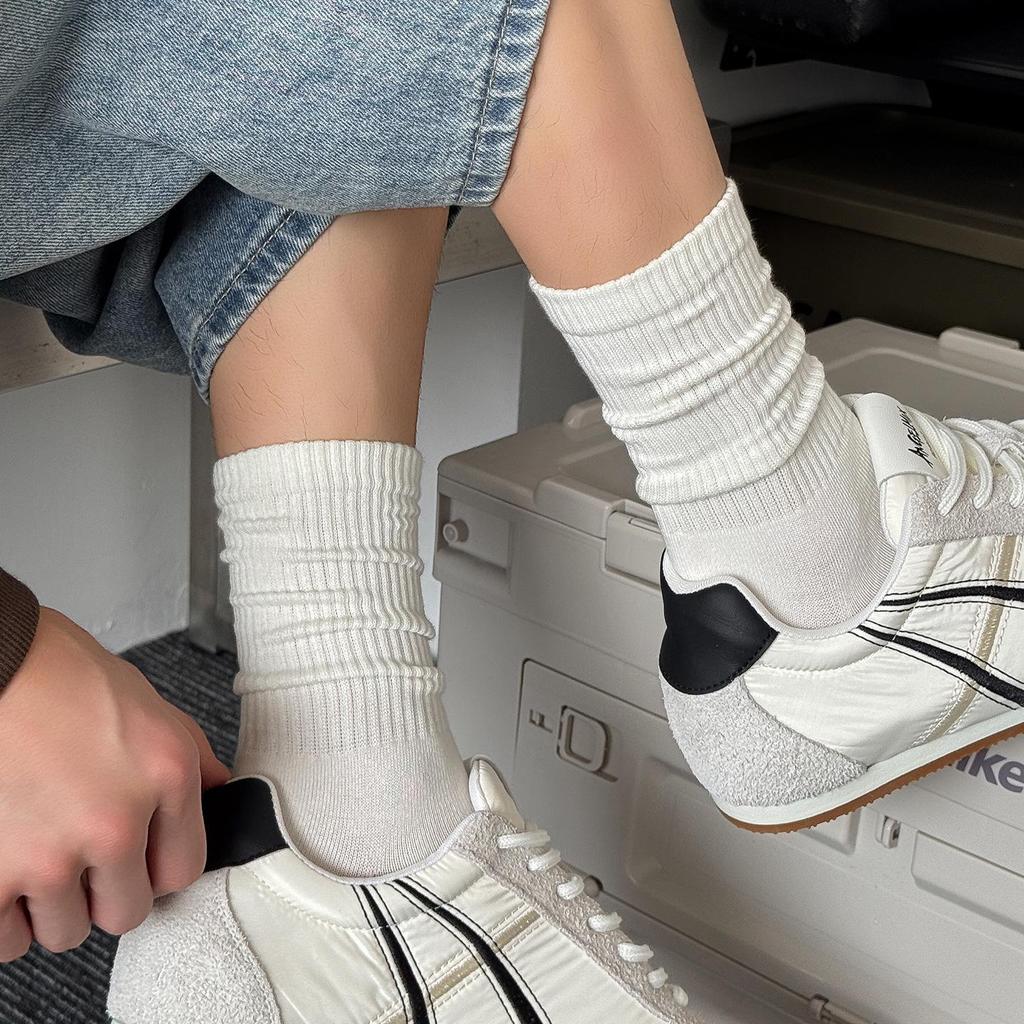 Men's Mid-Calf Cotton Socks, Fall/Winter, Solid Colors, Massage Sole, Breathable, Versatile Sports Style, Black and White.
