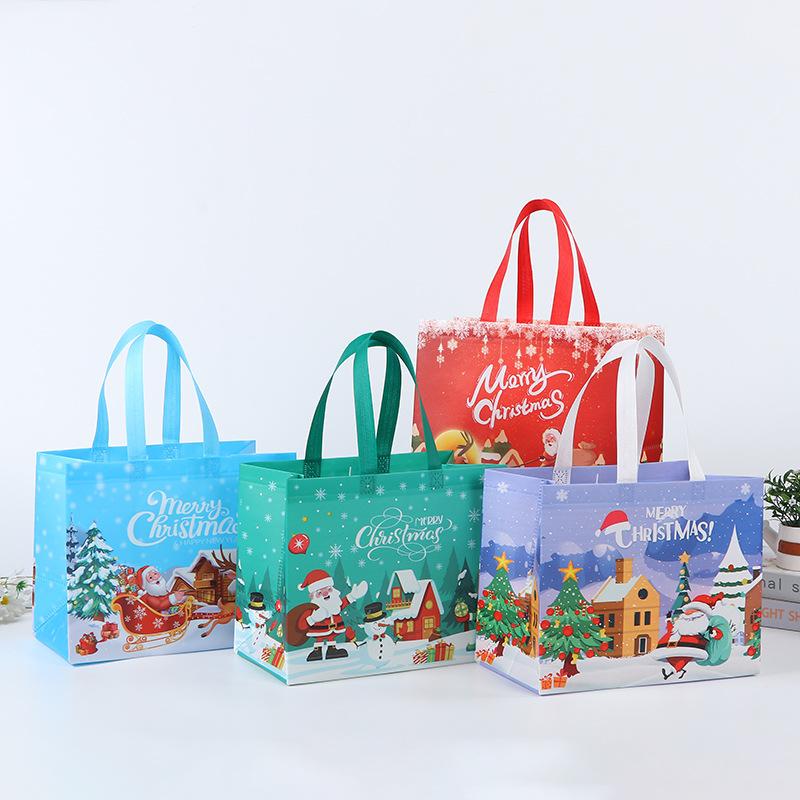 1pcs Christmas Gift Bag Santa Claus Non-woven Candy Gift Packaging Tote Bag Christmas Party Supplies Happy New Year