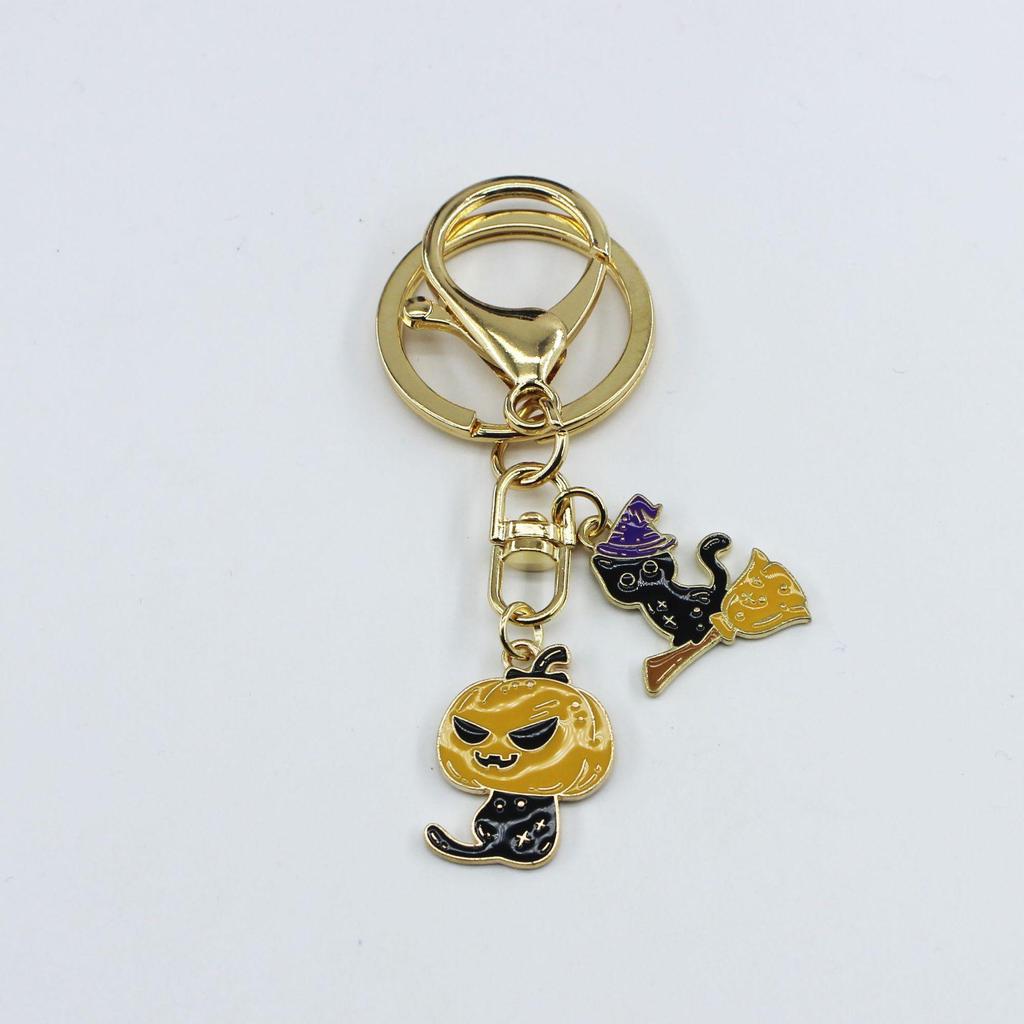 Halloween Cat & Bat Keychain with Wizard Hat, Drip Oil Skull, and Pumpkin Bag Pendant - Alloy Accessories.