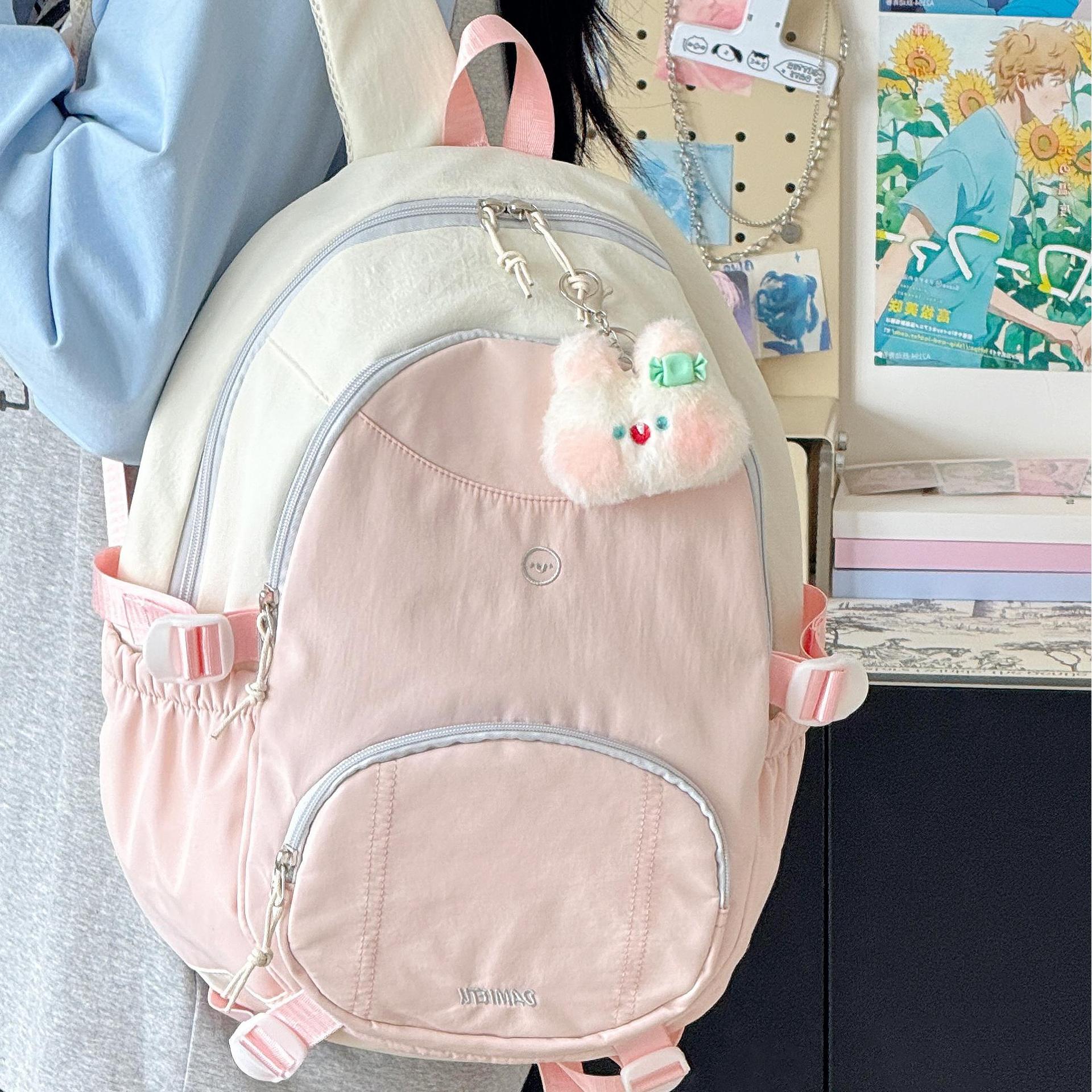 

High-value color matching schoolbag for female junior high school casual and versatile, simple backpack, large-capacity student computer backpack tide single bag розовый