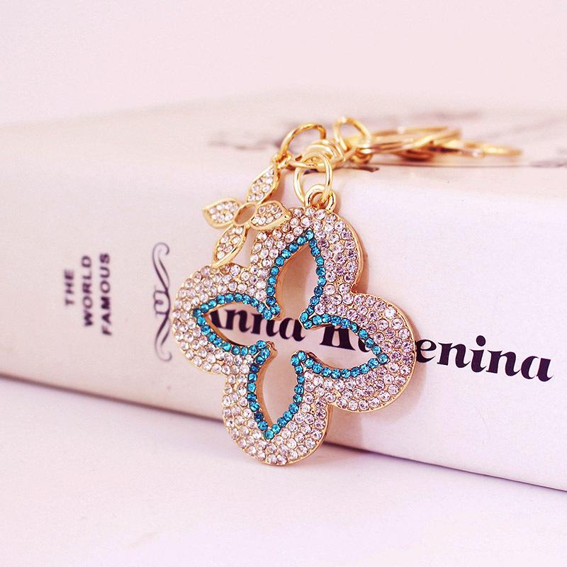 Exquisite Four-Leaf Clover Alloy Keychain Charm - Perfect Gift for Girlfriend, Bag Accent, or Keyring Accessory.