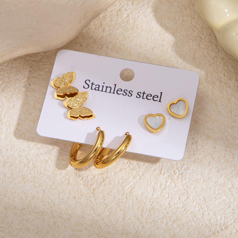 Elegant Four-Leaf Clover & Heart Earrings with Butterfly Detail, Titanium Steel Hoops - Non-Fading, Fashionable Summer Accessory