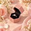 Hexagonal Ring Presentation Box with Black Interior, Gold-Tone Border Pattern, and Attached Lid for Retail Display