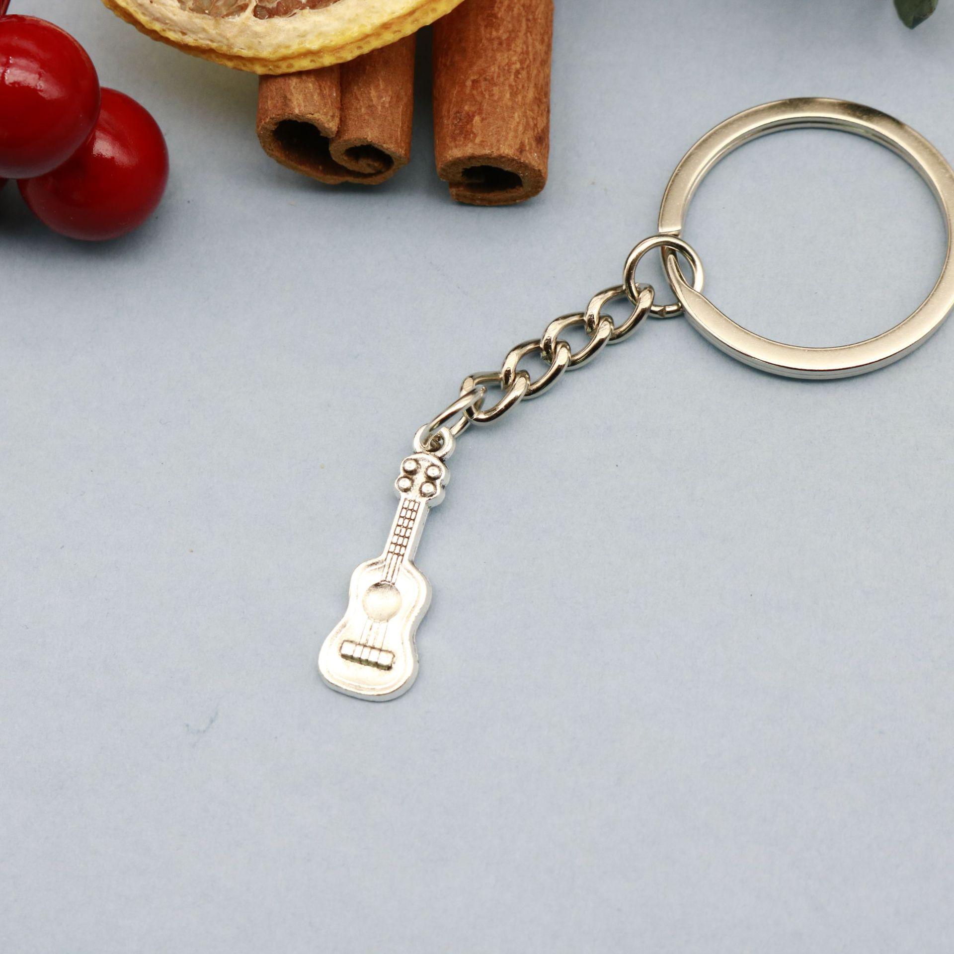 Hot Selling Foreign Trade Guitar Keychain Pendant серебряный