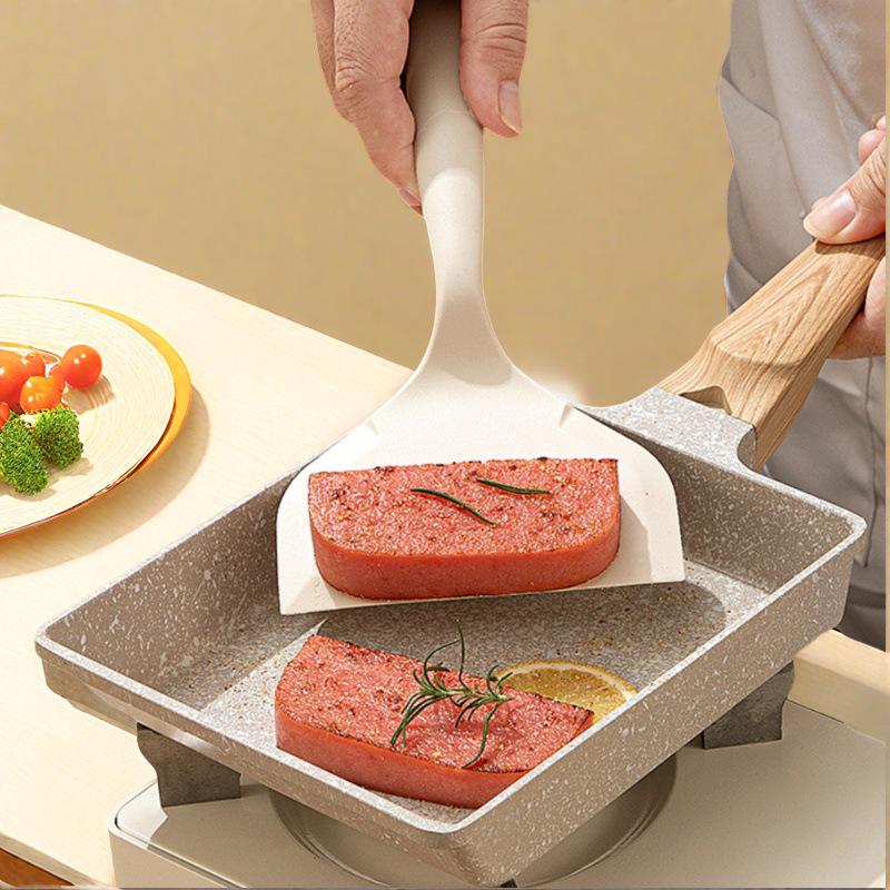 All-White Silicone Anti-Scald Spatula for Non-Stick Pans, High-Temperature Resistant for Stir-Frying, Pancakes, and Crepes.