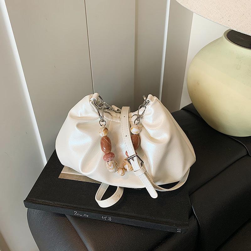 

Niche design bag women s new summer messenger bag casual pleated bucket bag белый