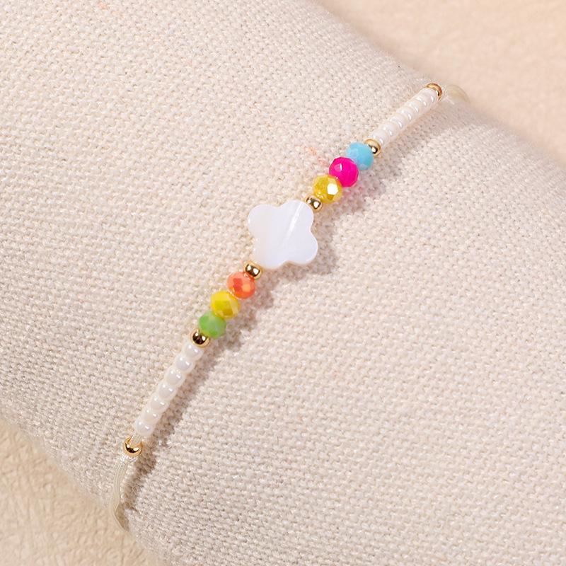 

Вишуканий браслет з бісеру з чотирилистою конюшиною та перлами