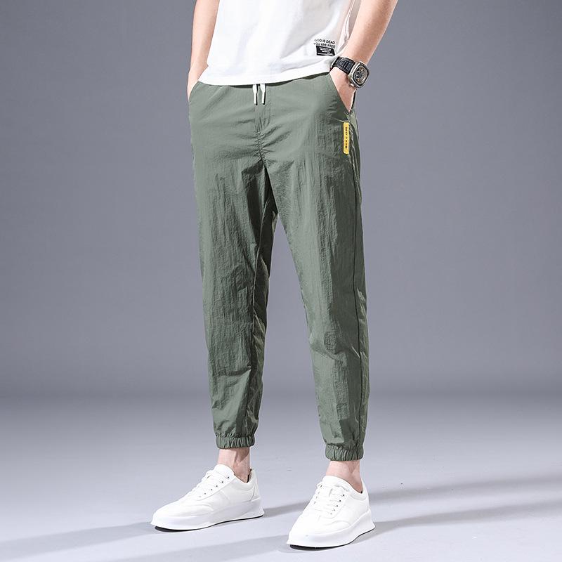 

Мужские ультратонкие однотонные дышащие нейлоновые спортивные брюки на шнурке 32