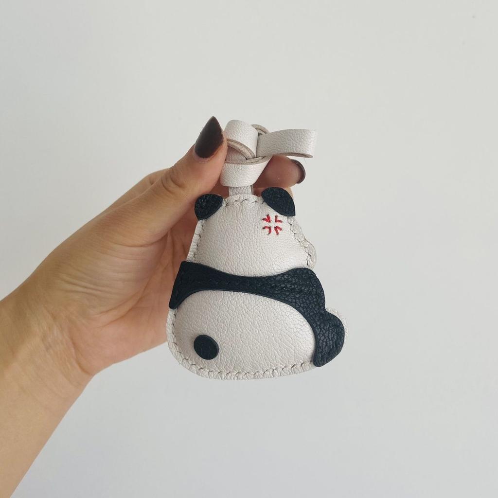 Genuine leather keychain with cute panda design, original accessory for car or bag