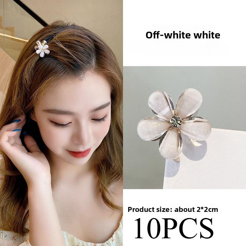 5/10PCS.Spring Camellia Hollow Small Claw Clips for Kids. Minimalist Floral Design, Durable Metal Texture, Secures Bangs Well.