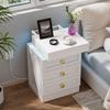 Bedside table, three drawers, with charging station, 2 AC power outlets/2 USB ports, European standard plug, white.