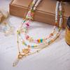 Bohemian Handgefertigter Seestern Sonne Anhänger Halskette für Damen Sommer Muschel Imitation Perle Reiskorn Perlen Choker Strandurlaub Schmuck