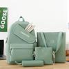 New girl backpack, primary and secondary school schoolbag, make-up bag, four-piece rabbit ear class backpack