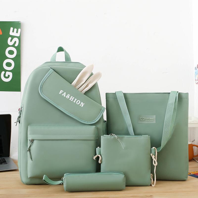 New girl backpack, primary and secondary school schoolbag, make-up bag, four-piece rabbit ear class backpack