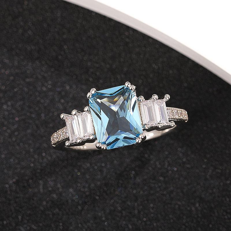 Copper inlaid imitation sea blue zircon ring, European beautiful women's engagement ring