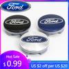 Nuevo Pegatina de Coche 2026 2025 Caliente Ford 54mm Emblema de Coche Tapacubos Original Emblema de Rueda Para Ford Focus MK2 Fiesta Mondeo She