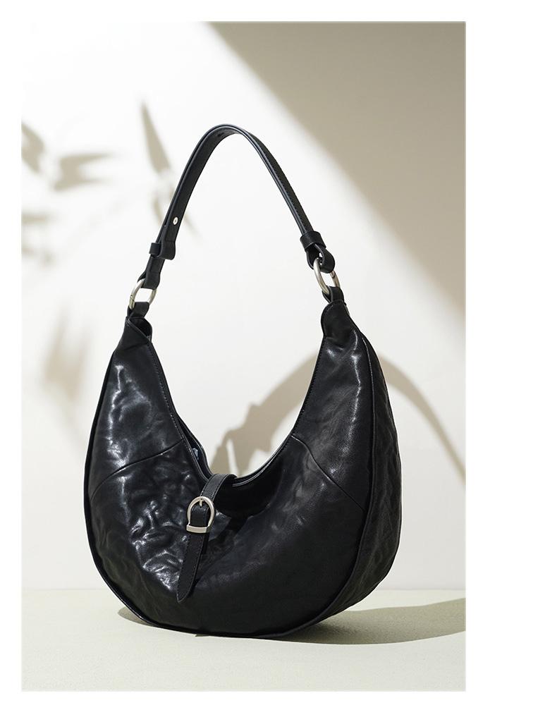 

Elegant Genuine Leather Shoulder Bag | Spacious Crescent-Shaped Travel Tote, Lightweight, Versatile, and Luxe чорний