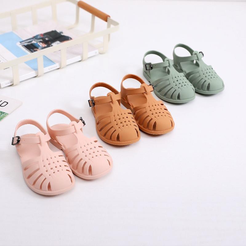 Children's sandals spring and summer boys soft-soled hollowed-out hole shoes girls flat-soled bag head jelly shoes baby children's sandals