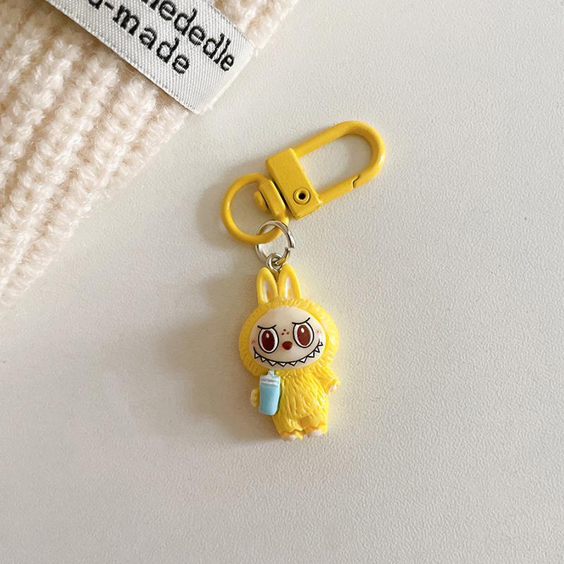 

Милый мультяшный кавайный брелок Лабубу подвеска забавный автомобильный брелок изысканный креативный рюкзак украшения аксессуары подарки 1PC жёлтый